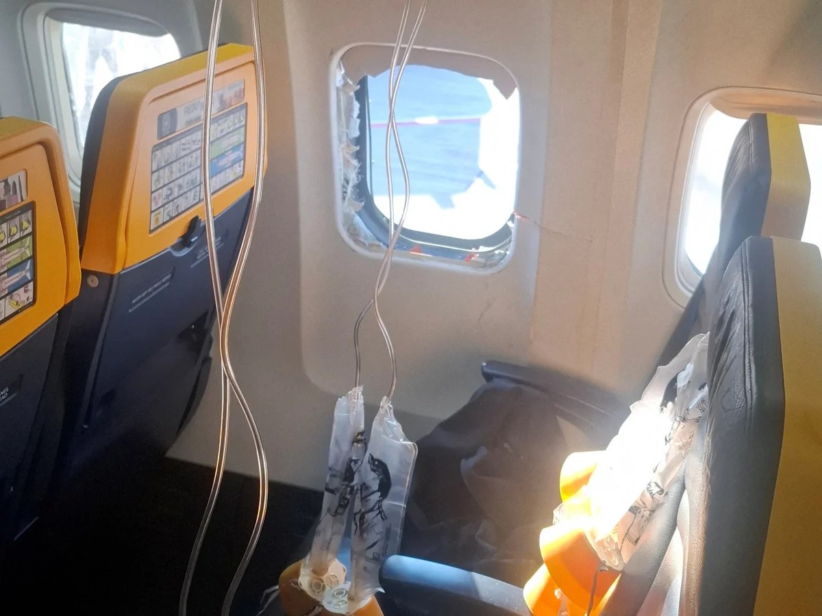 ‘If we die, we die together’: wife of Ryanair passenger almost sucked through window speaks