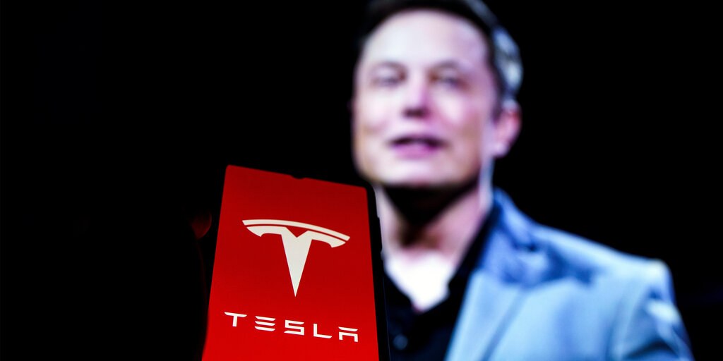 Tesla's Profit Drops 43% as Musk Starts Building Robots and Plans to Sell Driverless Cabs