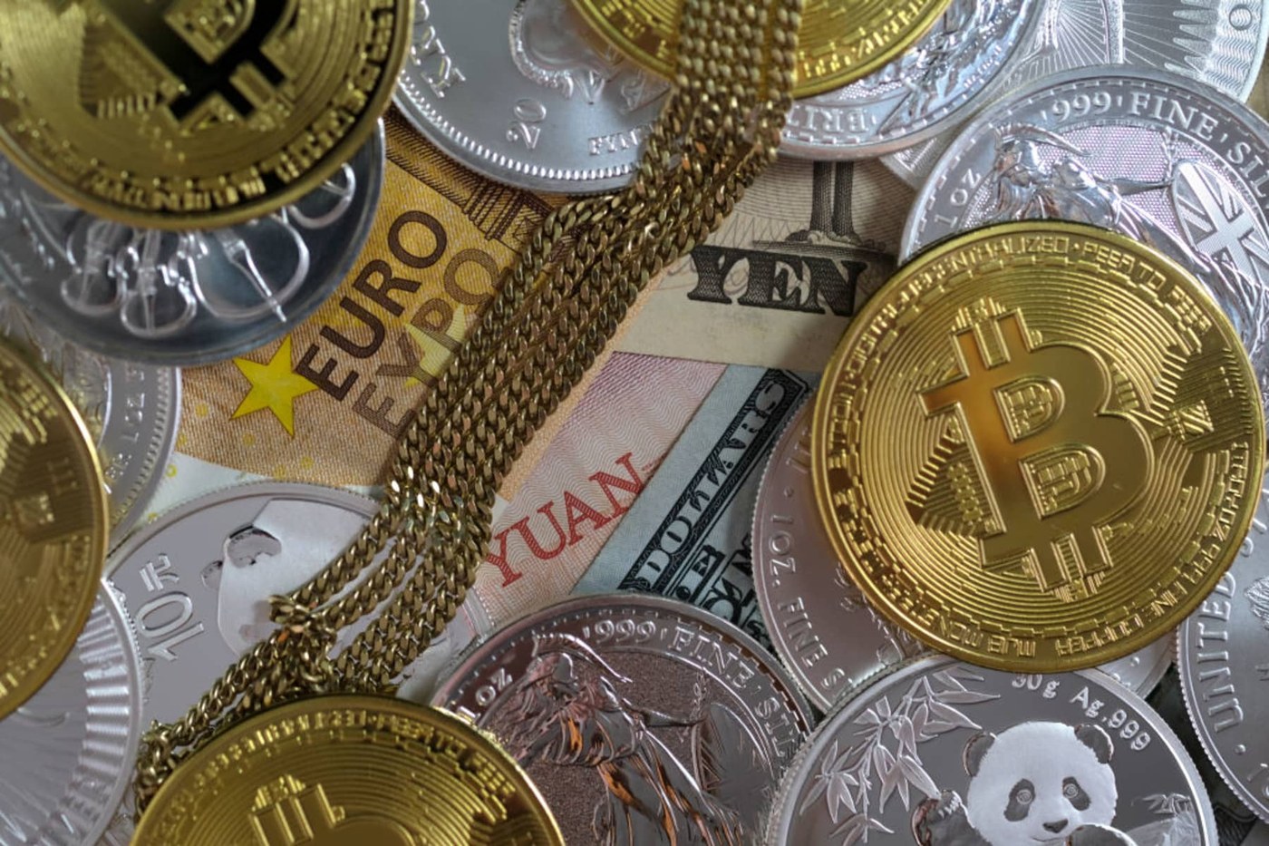 The 'debasement trade' returns after Bessent bond maneuver. Crypto and gold are back in style