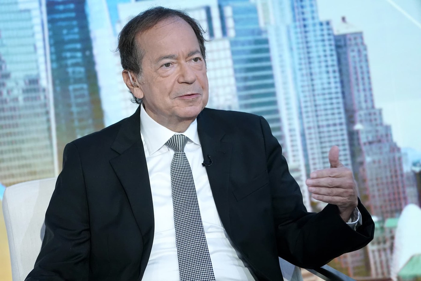 John Paulson says we are in the early stages of a long-term bull market for gold